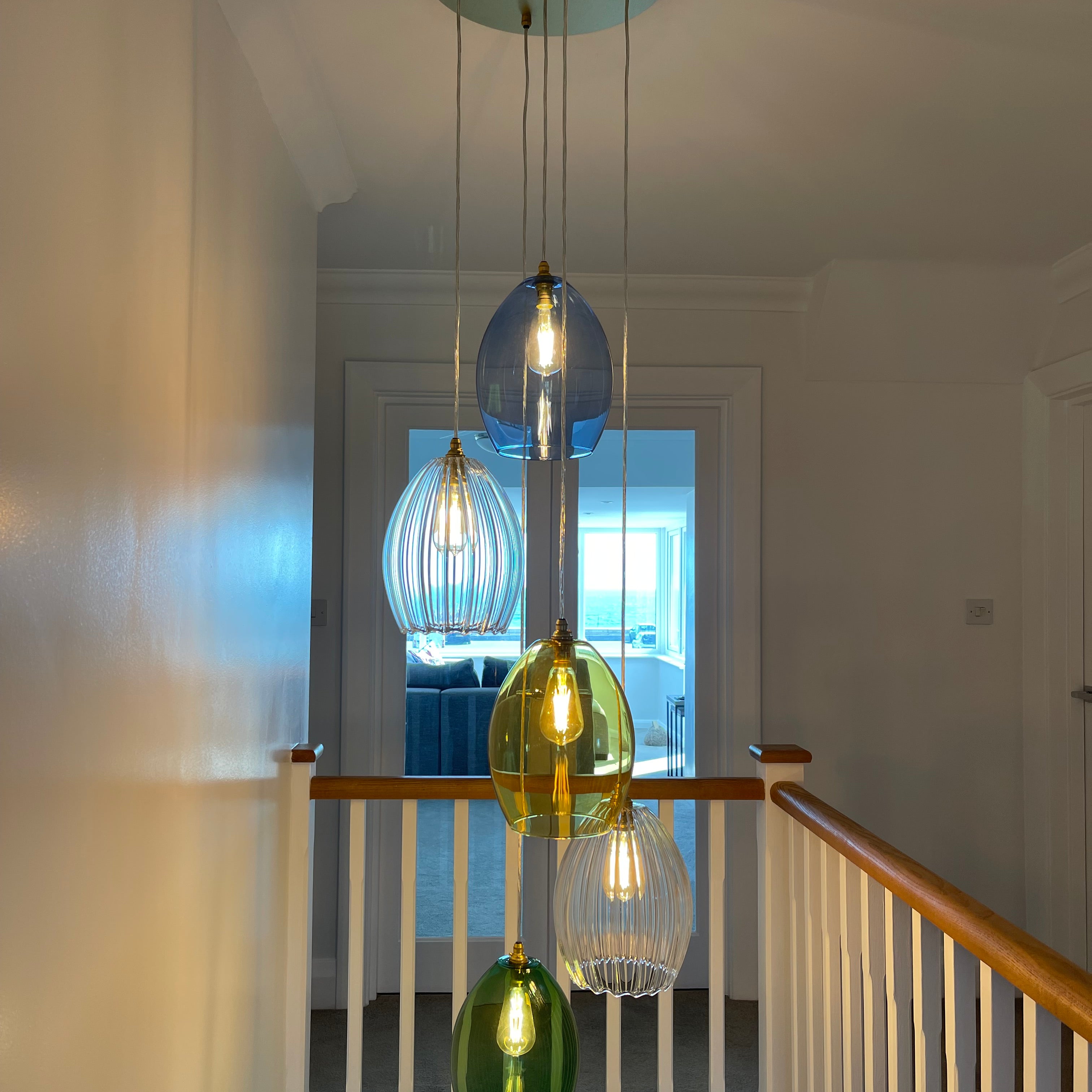 multi coloured glass chandelier pendant light glow lighting