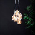 Illuminated individual pendant cluster chandelier light