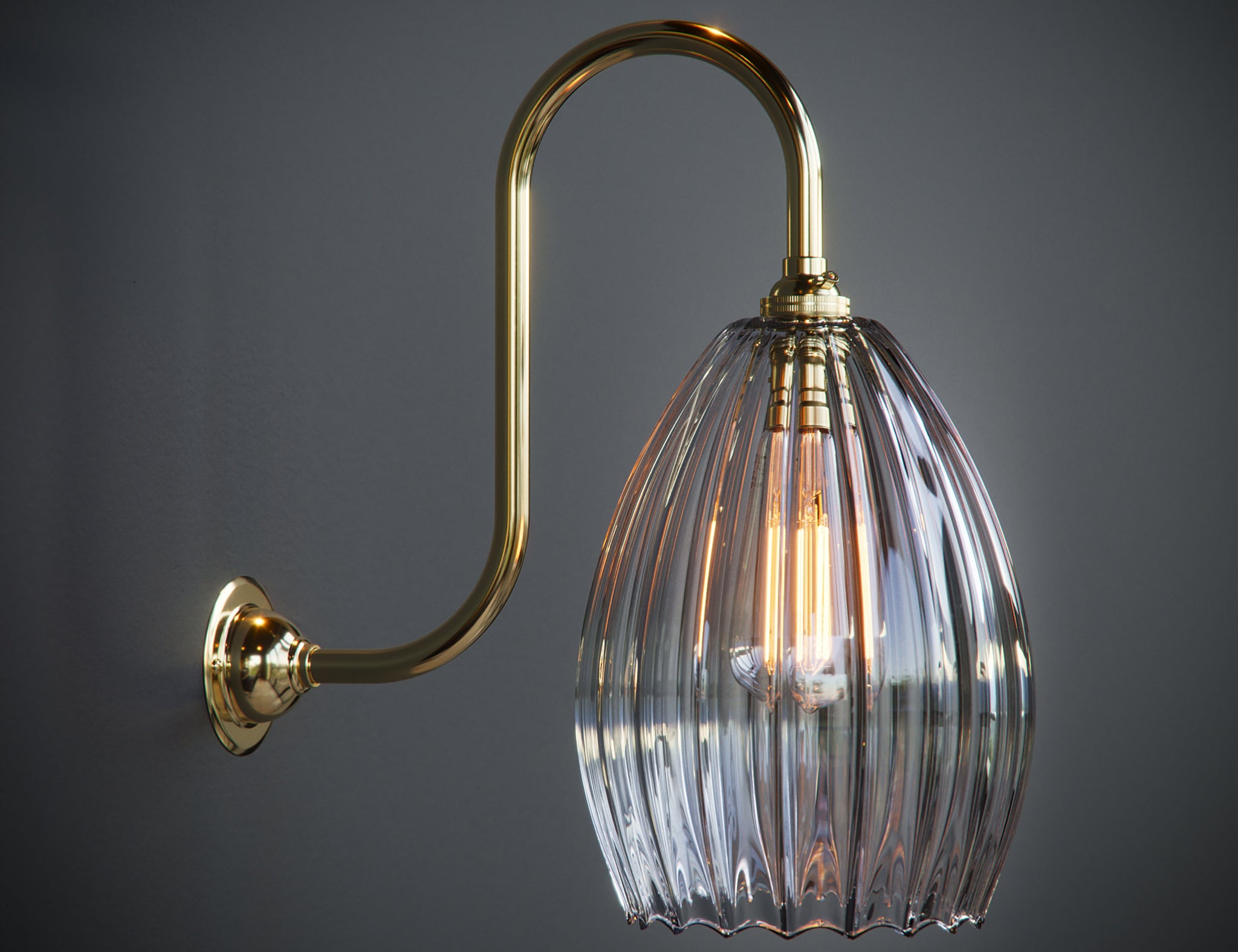 Illuminated swan neck wall light featuring clear ribbed glass and large antique bulbs