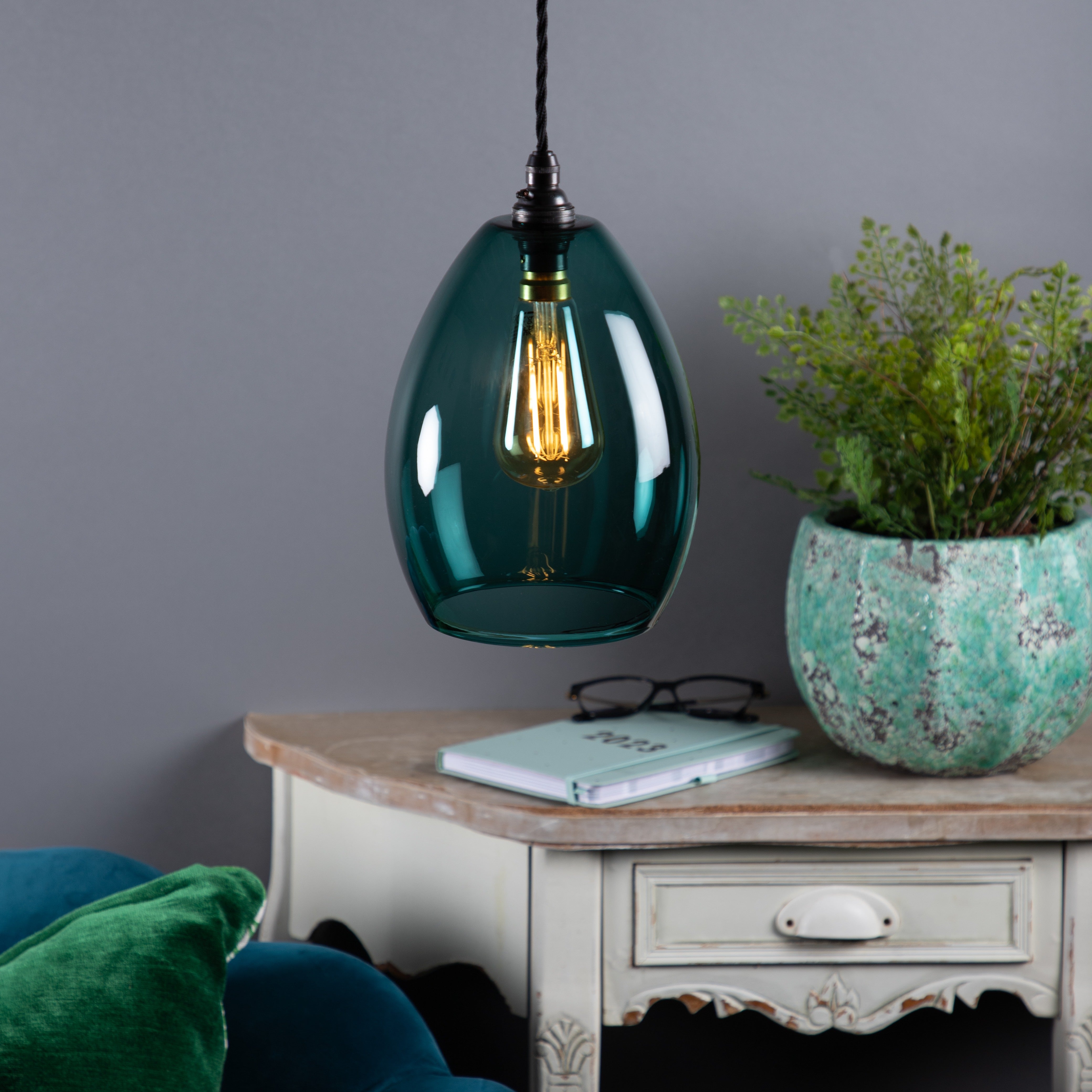 teal glass pendant light glow lighting 