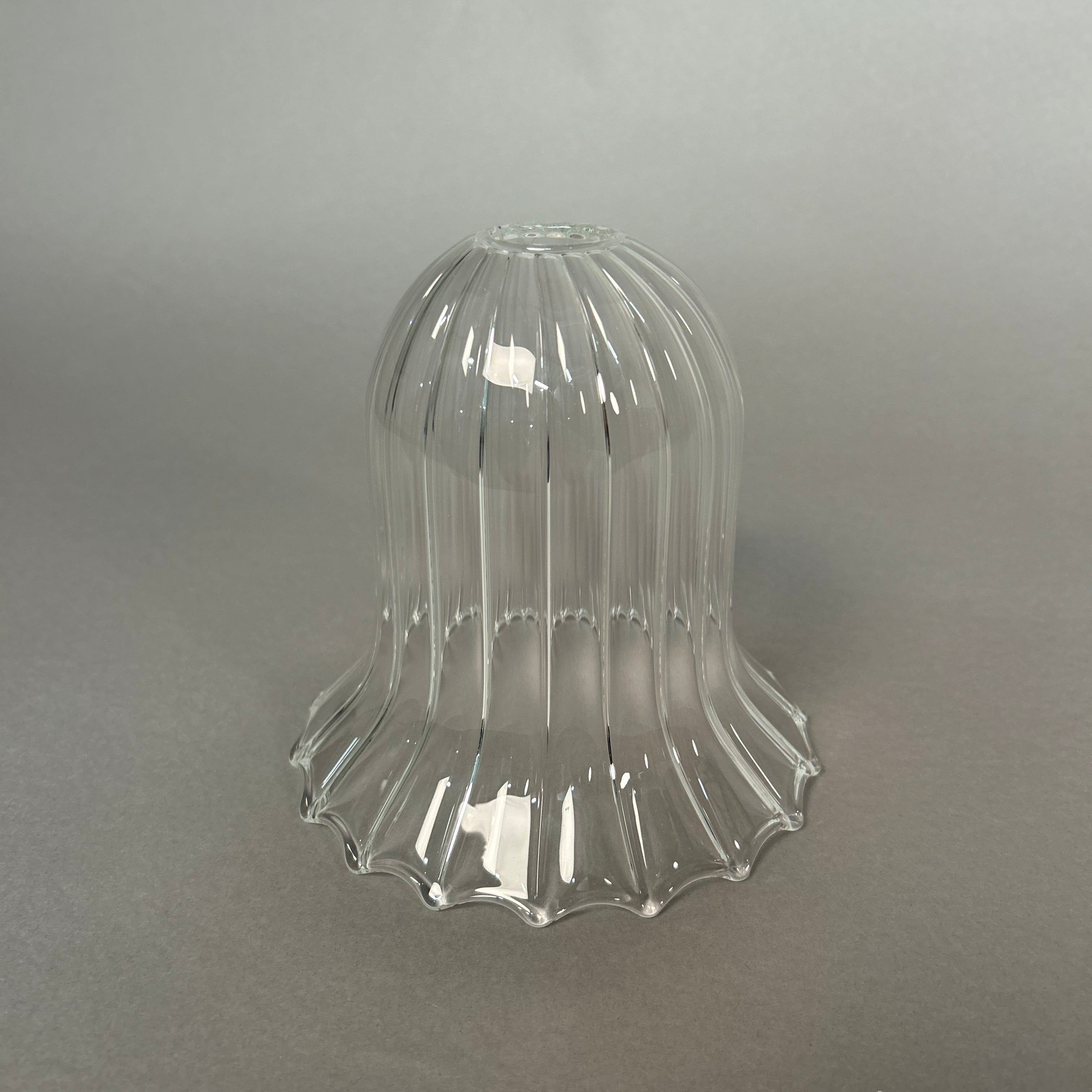 Clear glass decorative light on a gray background