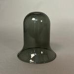 Dark grey glass light on a light grey background