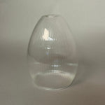 Clear ribbed glass pendant light on a light gray background