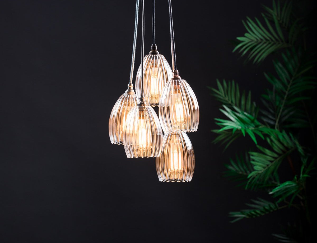 Illuminated individual pendant cluster chandelier light