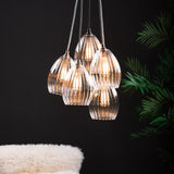 Large cluster chandelier light illuminated
