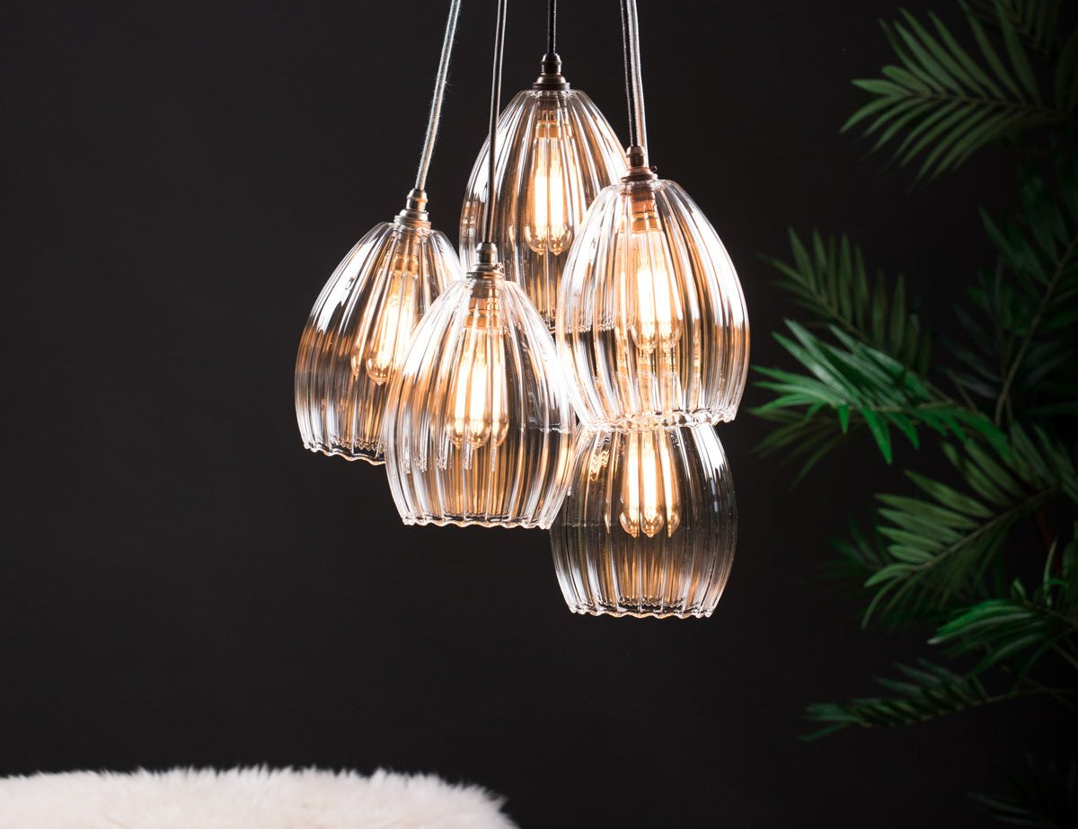 Large cluster chandelier light illuminated